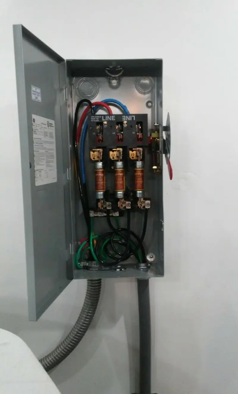 Three-phase disconnect switch installed for Smoke Detector Installation in Derby
